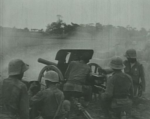 正在炮击国军阵地的日军75MM野战炮